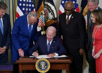 US President Joe Biden, healthcare costs, climate investment, minimum tax rate