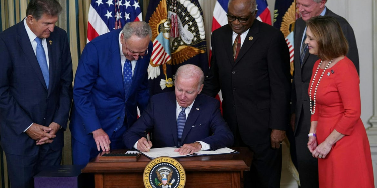 US President Joe Biden, healthcare costs, climate investment, minimum tax rate